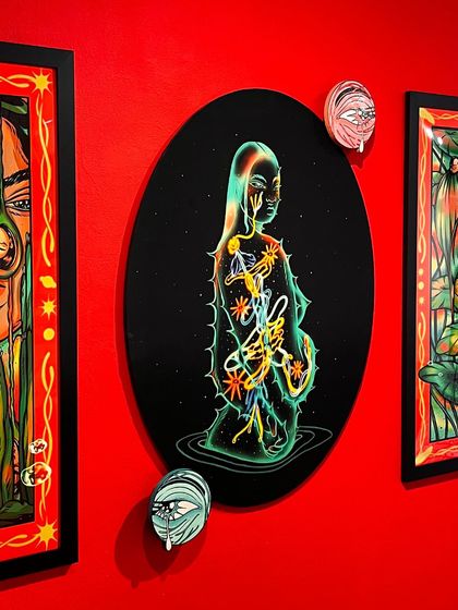 A view of my thesis illustrations, 'The Nature of Being,' installed in a gallery. This shows how the pieces are designed to be viewed as a cohesive collection.