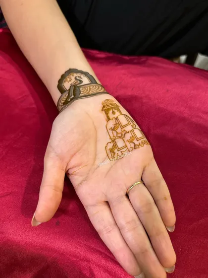 The initial outline of the elephant procession design.