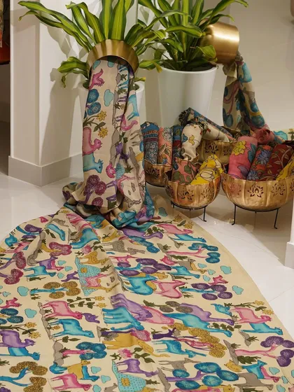 This is a glimpse into my Kalamkari Edition, featuring a wide array of hand-painted dupattas and fabrics from the Indralokam series. Each piece is a unique story, available for you to customize into your dream outfit.