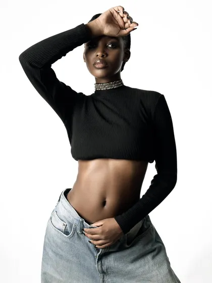 A dynamic pose that adds a touch of editorial flair to a simple studio shoot. This kind of image works well for both product pages and social media content.