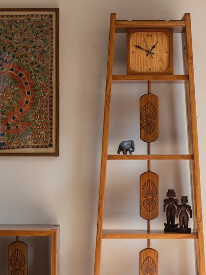 A detailed look at the Mysore Inlay Collection. These images highlight the functional aspects, such as the detachable bench on the bookshelf and the removable tray on the center table, alongside the exquisite craftsmanship.