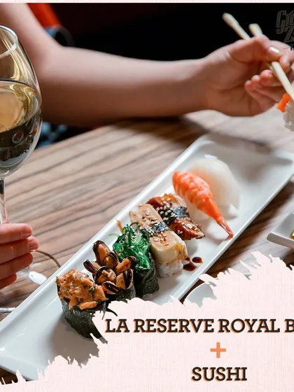 The crisp acidity and fine bubbles of our La Reserve Royal Brut cut through the richness of sushi, cleansing the palate between bites. It's an unexpected but delightful pairing.
