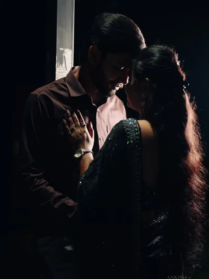 **(Hero Item)** This is the kind of cinematic portrait I love to create. I focus on raw emotion and use dramatic lighting to capture the connection between two people. It’s more than a photo; it’s a moment that feels like a scene from a film.