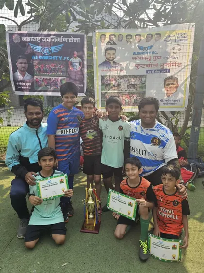Our U11 team celebrating their championship win at the Almighty FC tournament, one of three titles won by our academy.