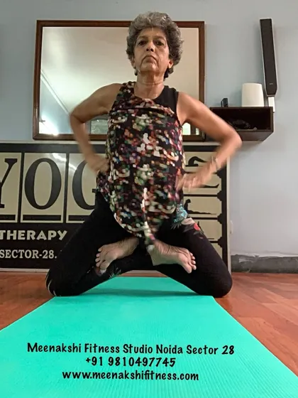 A seated pose that helps to open the hips and prepare for lotus pose.