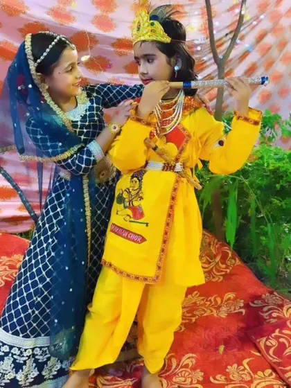 We love creating magical moments for our youngest dancers. Here are two of our students dressed as Radha and Krishna for a Janmashtami celebration, fully costumed and ready for their performance.