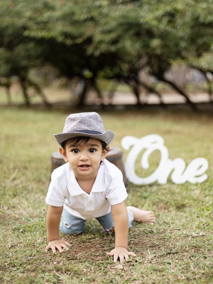 Another crawling action shot, capturing his determination and curiosity as he explores the park.