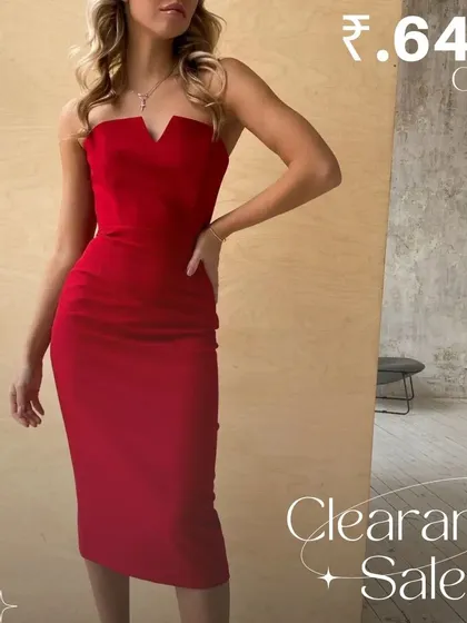 A beautiful strapless red midi dress with a unique V-neckline. Find this stunning party dress in my clearance collection.