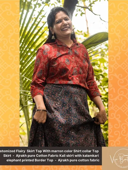 A full view of our customized flairy skirt and top. The rich colors and traditional prints make it a perfect outfit for festive occasions.