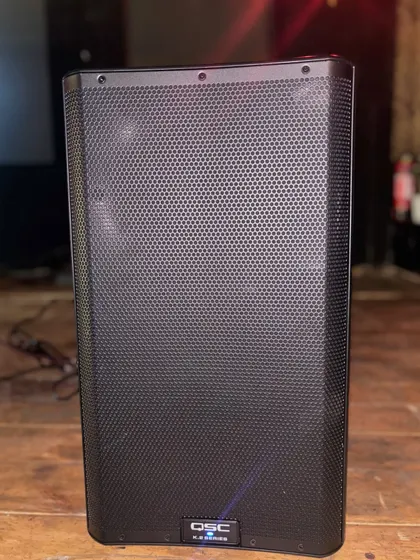 Another angle of the QSC K12.2 speaker, ready for action on the club floor. Its robust build and professional-grade audio performance make it a reliable choice for high-demand environments.