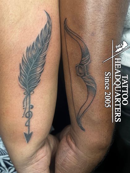 A matching tattoo set for a couple, one with a feather arrow and the other with a bow.