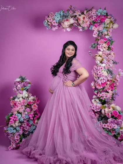 Another beautiful portrait from the maternity shoot. The mom-to-be looks like a princess in her flowing gown and soft, glowing makeup.