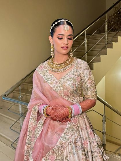 A close-up of Saloni's makeup. The eyes are softly smoked out, and the skin has a beautiful, healthy glow.