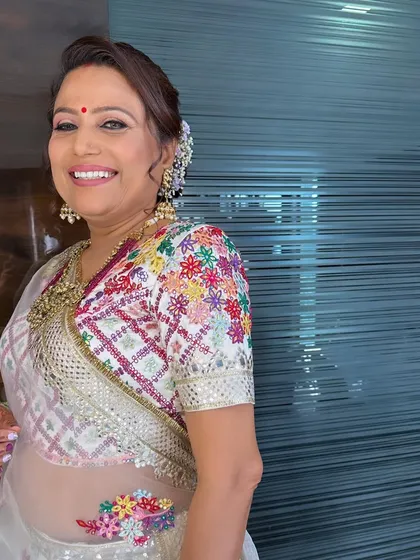 Simplicity is the ultimate sophistication. This look for a wedding guest is all about clean, fresh makeup that enhances her natural beauty and complements her colorful, embroidered outfit.