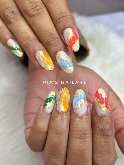 Another look at the colorful marble and foil design, showing how different the pattern is on each hand.