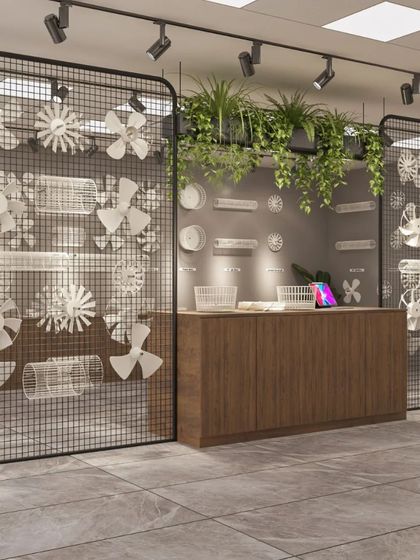 An innovative retail display using industrial mesh screens to showcase fan components. This design turns functional products into an artistic installation.