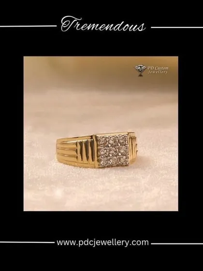 A tremendous gents' ring crafted in 18kt hallmarked gold. The square face is set with an array of natural diamonds, and the ribbed detailing on the band adds a touch of modern texture.