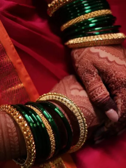 Another shot showing the beautiful contrast between the dark henna stain and the client's traditional attire.