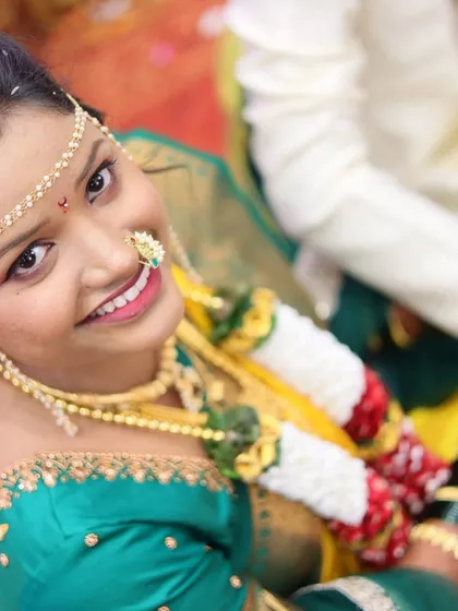 The pure joy on my bride's face. This candid shot captures her happiness during the wedding ceremony.