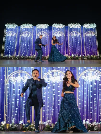 The couple's high-energy dance performance on a beautifully lit stage. We love capturing the fun and coordination of Sangeet night choreography.