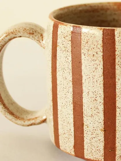 The handle of the Coffee Drip cup is finished with the same speckled glaze as the body, ensuring a cohesive and tactile feel. It’s all about the small details.