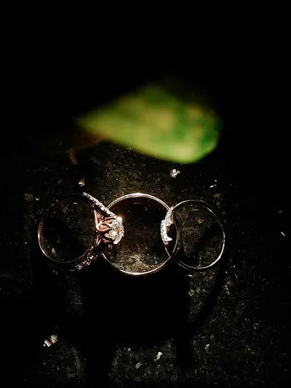 An artistic and creative shot of the wedding rings. I love finding unique ways to photograph these important symbols of your commitment, turning them into a piece of art.