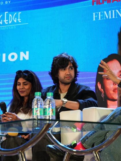 A close-up on the panelists, capturing their animated expressions as they share their experiences with the student audience.