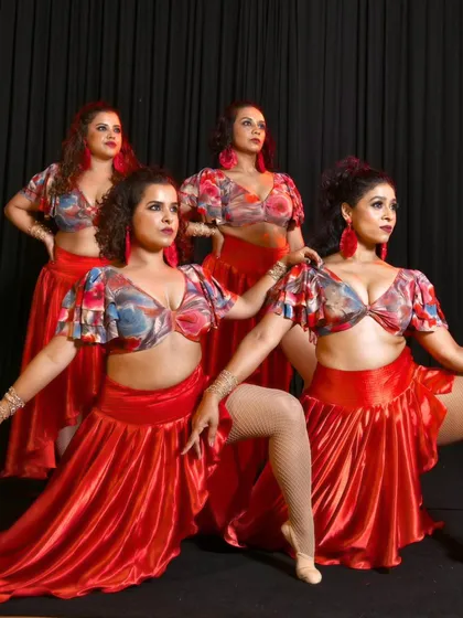 A powerful group pose from our studio photoshoot. The composition of this shot highlights the individual strength of each dancer while showing our unity as a team.