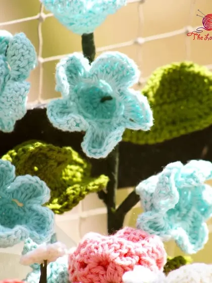 A detailed shot of the light blue flowers in one of my custom bouquets, showing the delicate stitch work.