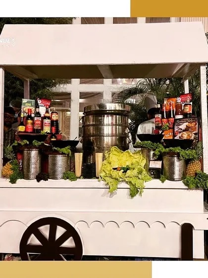 A full view of our charming, cart-style dim sum station, perfect for outdoor events and themed parties.