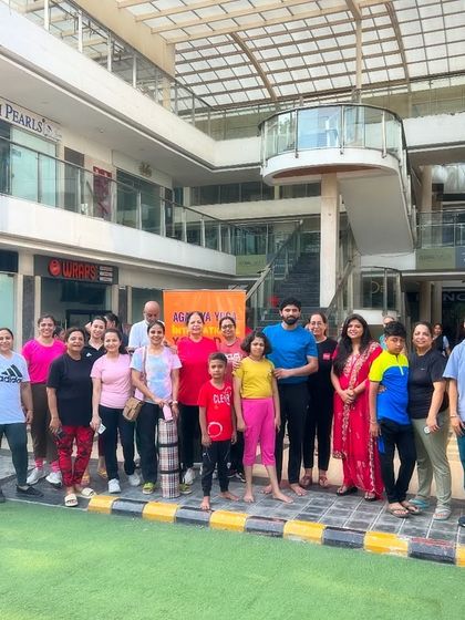 A group of dedicated members, including families and kids, who joined our public yoga workshop. Yoga is for everyone.