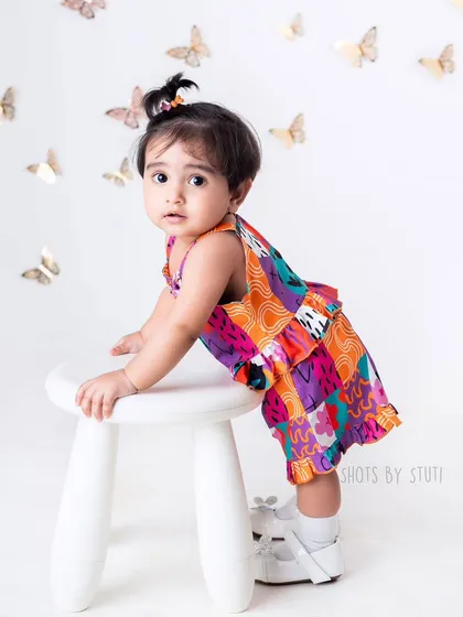 A vibrant and modern look for this little fashionista. This image shows the versatility of a studio session, where we can create many different moods and styles.