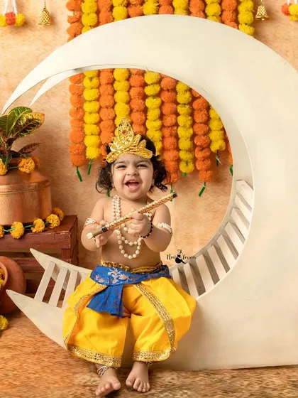 A joyful shout from our little Krishna on the moon. We love capturing these energetic and expressive moments that show your child's personality.