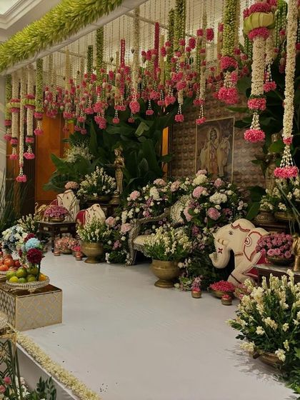 A side view of the dense floral setup, showing the depth of the arrangements.