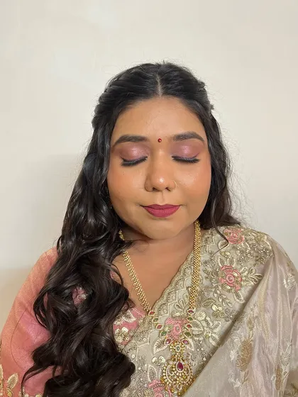 A closer view of the eye makeup and her radiant skin. I work to make sure every detail is perfect, creating a look that is truly a work of art.