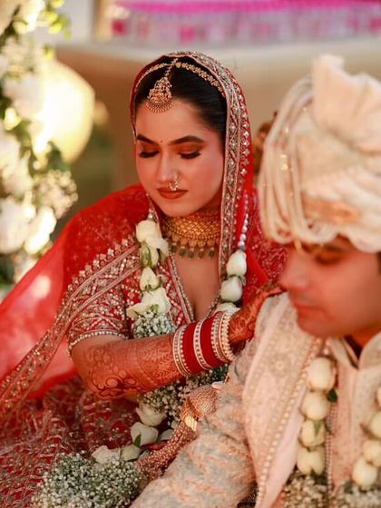 A candid shot during the ceremony. The makeup is subtle yet defining, ensuring the bride looks her absolute best during these precious, once-in-a-lifetime moments.