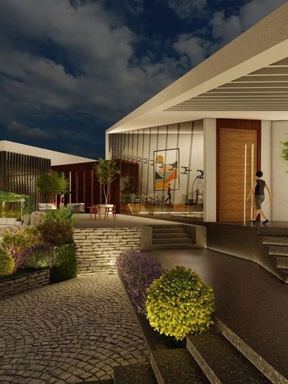 The pedestrian approach to the farmhouse entrance. We used a combination of cobblestone pathways and floating steps, surrounded by lush planting and soft landscape lighting, to create a gentle and inviting transition from the outdoors in.