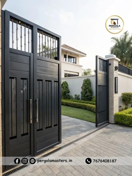 A stately and robust gate design with a classic yet modern feel. The solid black panels are accented with a traditional-style top section, offering a timeless look that provides both privacy and security for a large property.