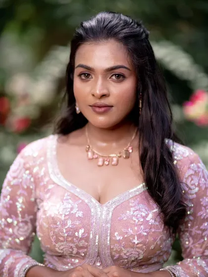 A close-up of a model's celebrity-inspired makeover, with a radiant glow that's perfect for a reception.