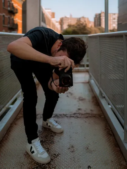 A shot of me during a photo walk in New York. I often use my Leica Q2 for street photography to capture candid moments. The process of just walking and observing is a big part of my creative work.