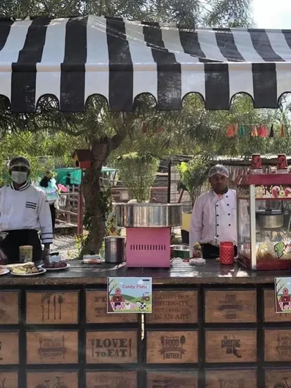 A candy floss and popcorn station at the farm party. These classic funfair treats are always a big hit at children's birthday parties.