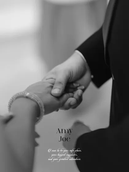 A close-up of hands intertwined, a simple gesture that speaks volumes of trust and partnership. It is in these small, unscripted details that the greatest love stories are often told, a promise to be a safe place and the greatest adventure.