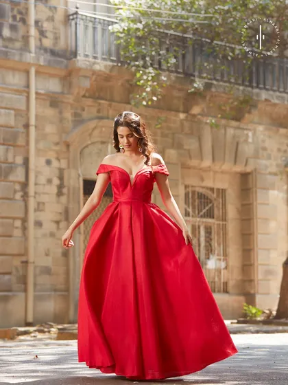 Feel like you're in a fairytale with this show-stopping red off-the-shoulder ball gown. It's the perfect rental for a grand reception, a black-tie event, or any night you want all eyes on you.