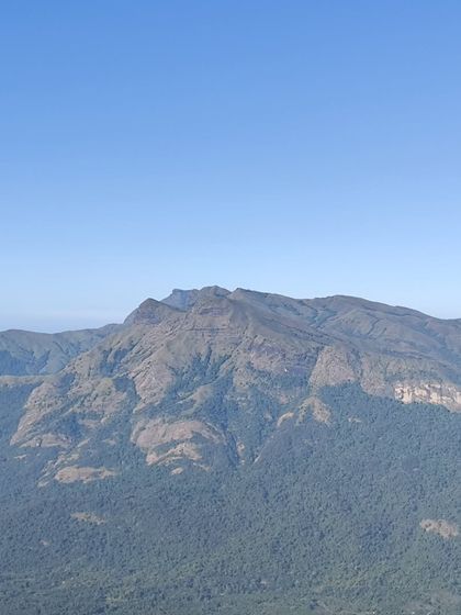 A clear day view of the mountains in the Bandaje region, showing the rugged and beautiful landscape.