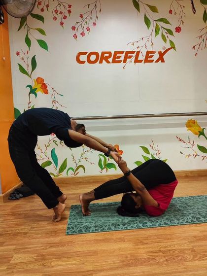 This assisted plow pose is a great example of how partners can help each other achieve deeper stretches safely, releasing tension in the back and shoulders.