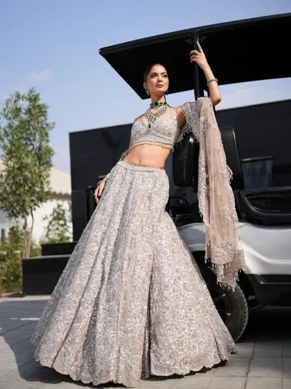 Dripping in elegance and luxury. I styled this silver lehenga with a dramatic pose to showcase its full, flowing skirt and modern silhouette.