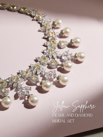The Yellow Sapphire, Pearl, and Diamond Bridal Set, presented to highlight its golden hues and pure whites. This is a symphony of color and light for the modern bride.