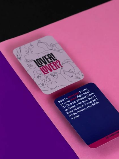 I had always wanted to try this table illusion trick. This shot uses colored paper to create a geometric, high-contrast background for the game cards, resulting in a modern and eye-catching image.