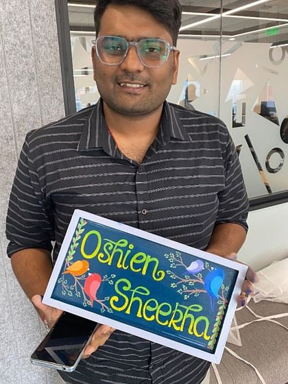 Another beautifully crafted nameplate from our office paint party. These workshops are a great way to unwind and create a piece of personalized decor.