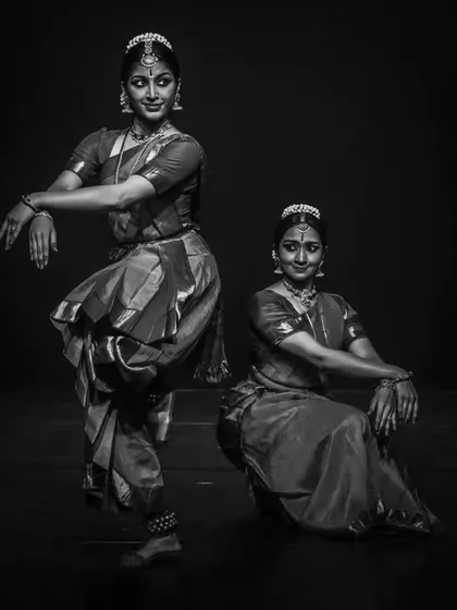 A black and white photograph from our duet performance, highlighting the sculptural quality and timeless elegance of Bharatanatyam postures.